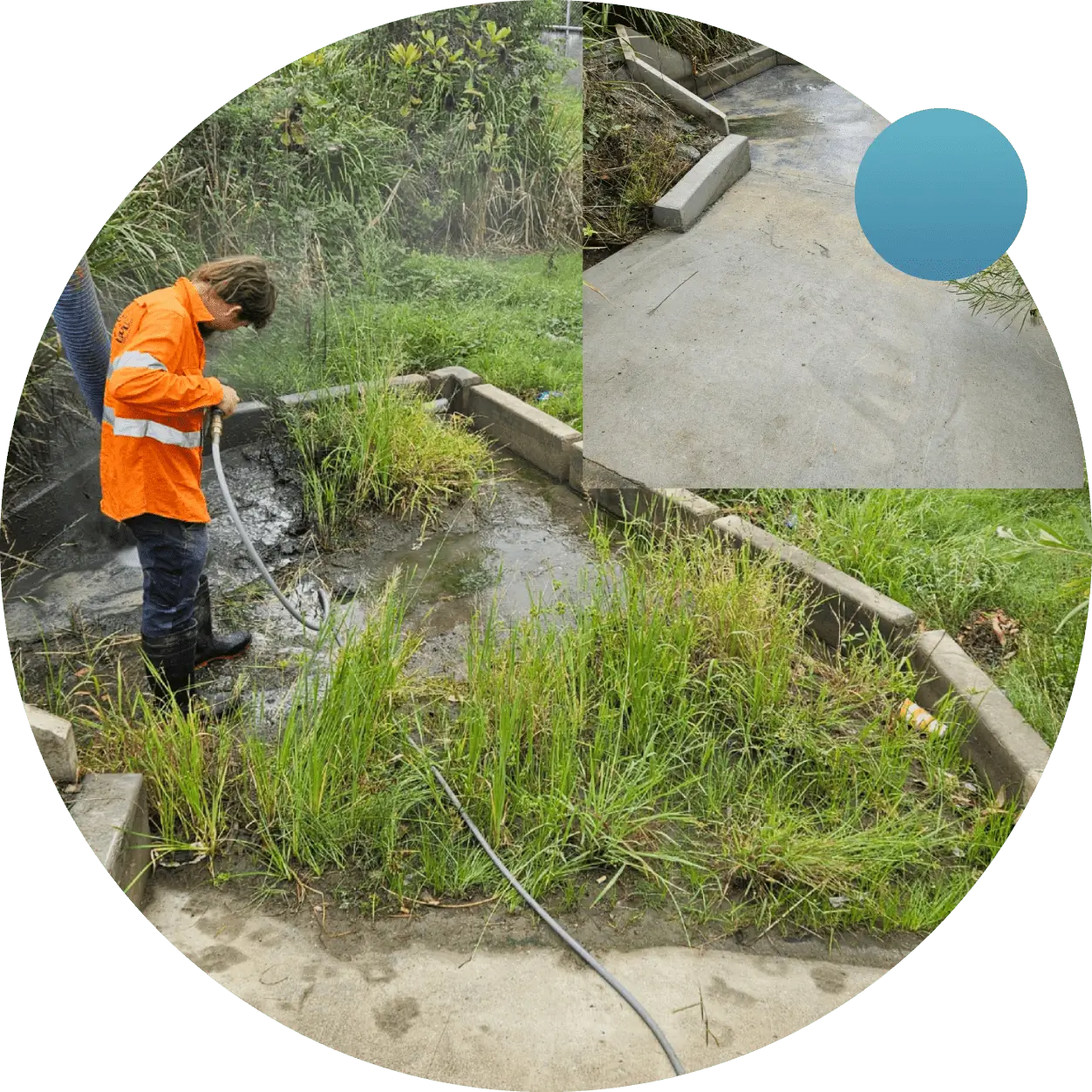 A person in an orange jacket is using a hose to clean up the grass.
